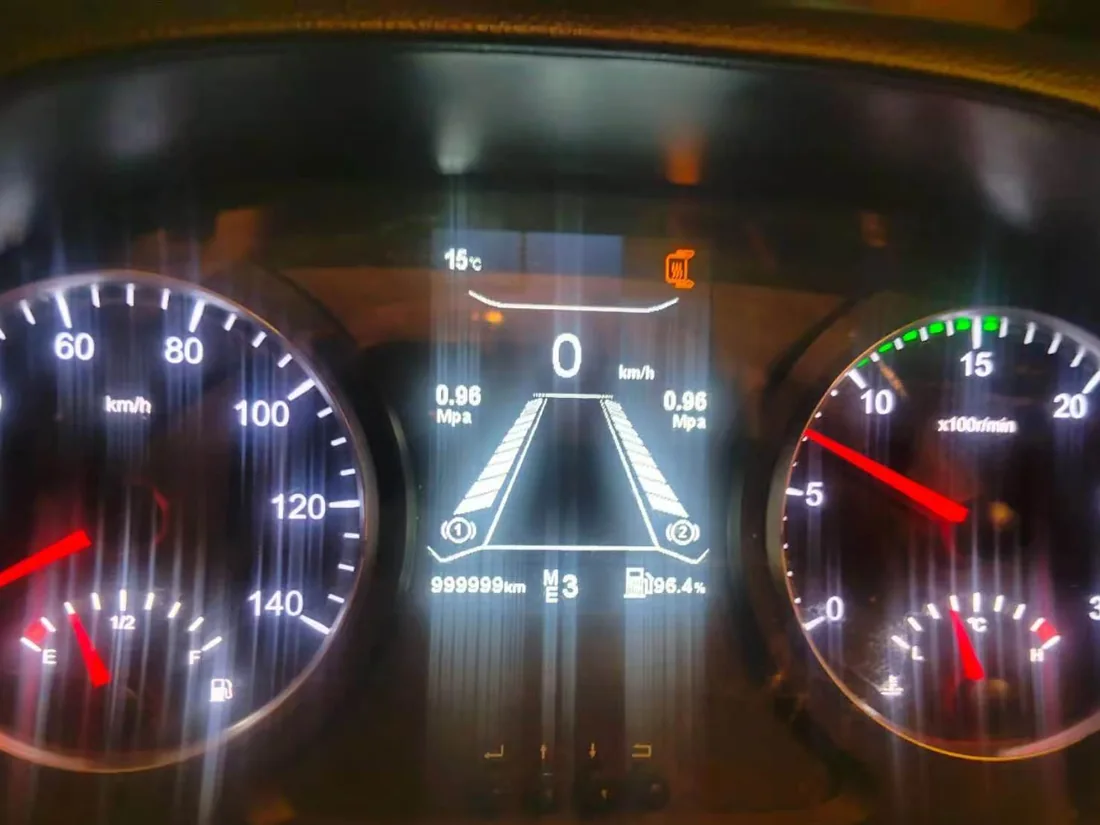 Instrument cluster of a used truck showing odometer reading